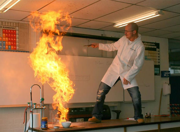 Teacher playing with fire in calssroom