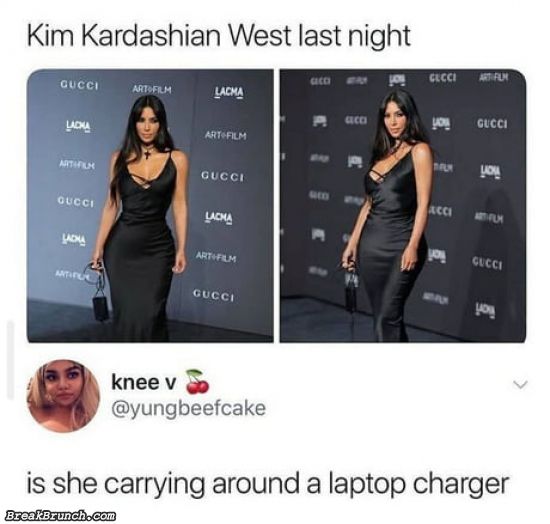 Kim Kardashian is carrying laptop charger